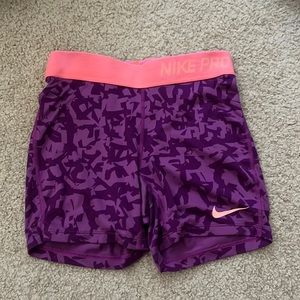 Nike pros in purple